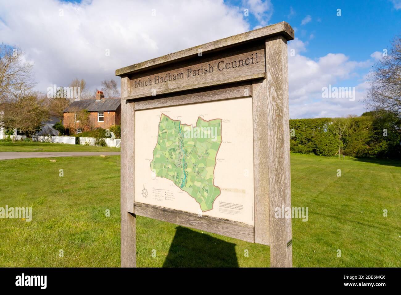 Wooden parish map board on a village green